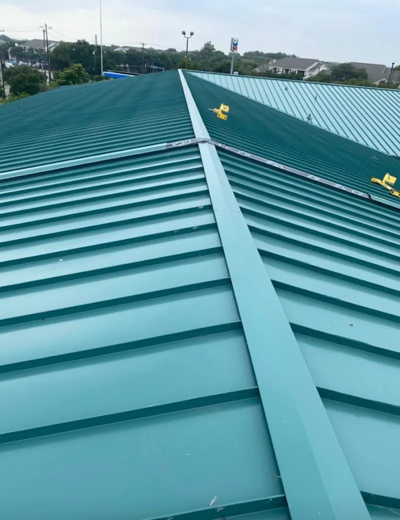 Green commercial metal roof ridge and valley for Metal Roof Repair in Tonawanda