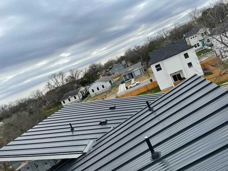 Standing seam metal roof panels with vents for Skylight Repair in Tonawanda